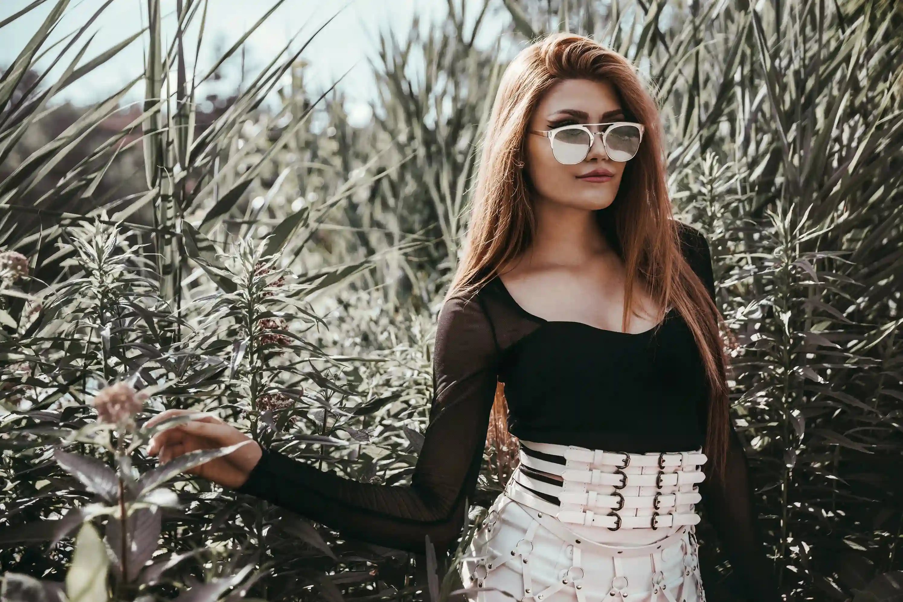 files/model-poses-near-bushes_11zon.webp